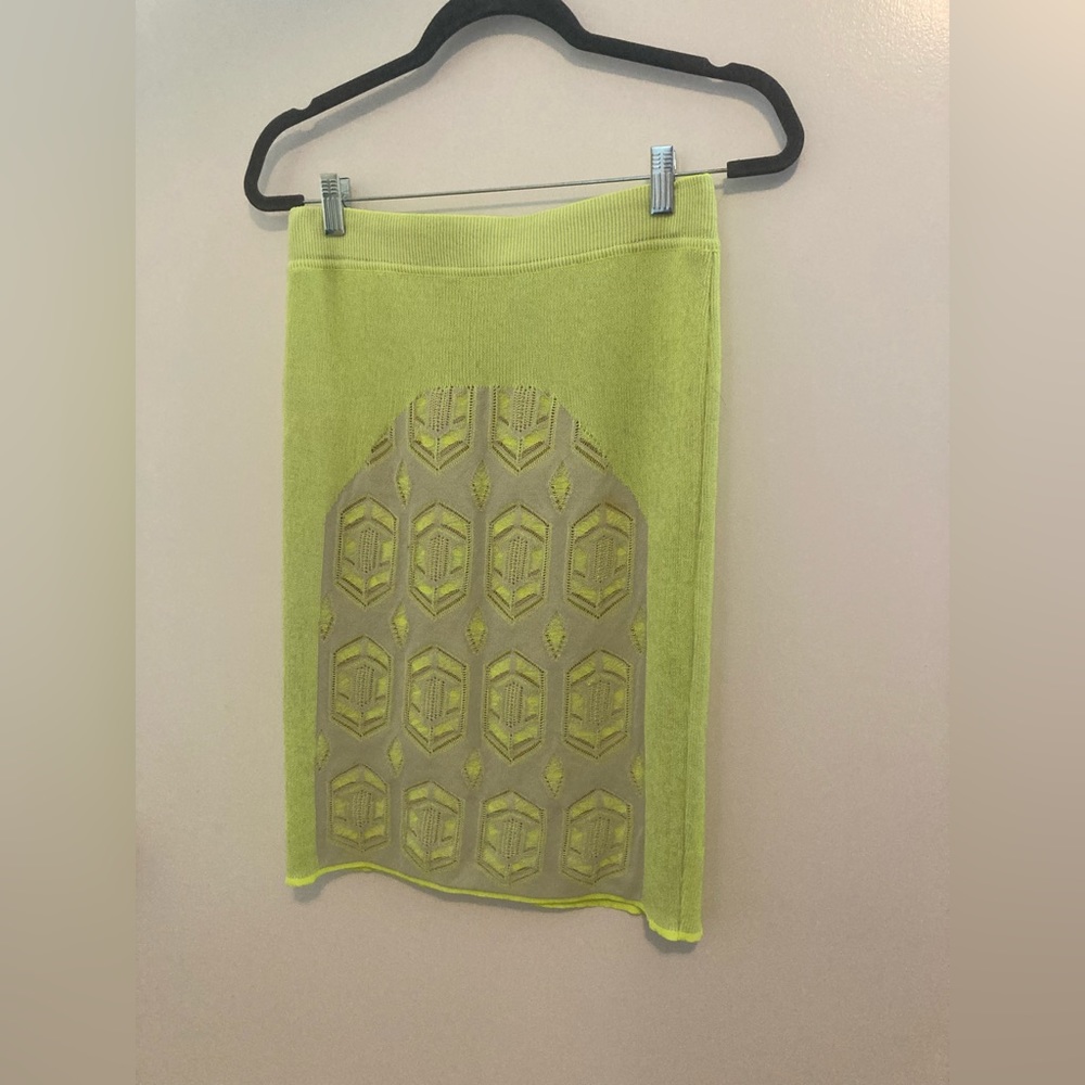 Dagmar casual skirt— like green with beige lace overlay on front.